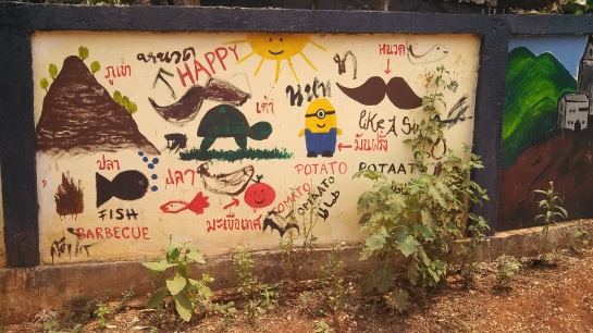A wall painted by the students of the village school.